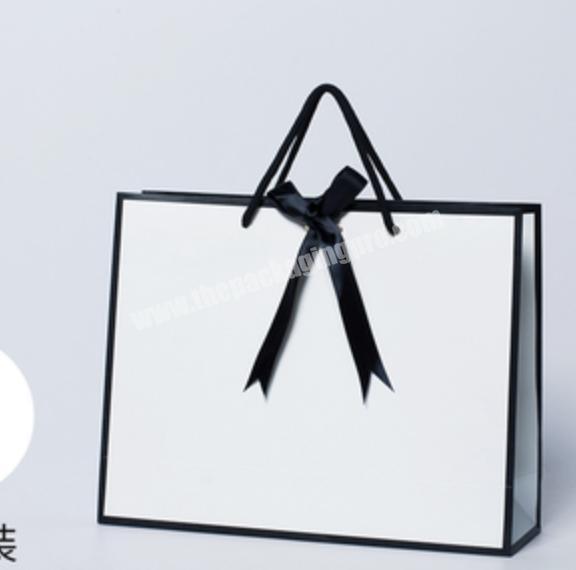 New design Hot Stamping Matt Kraft big size shopping Paper Bag With custom Handles