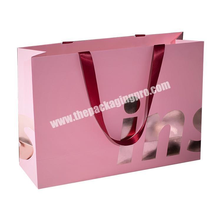 custom logo printing  Cheap art paper Recycled branded smart retail paper shopping bags with ribbon handles