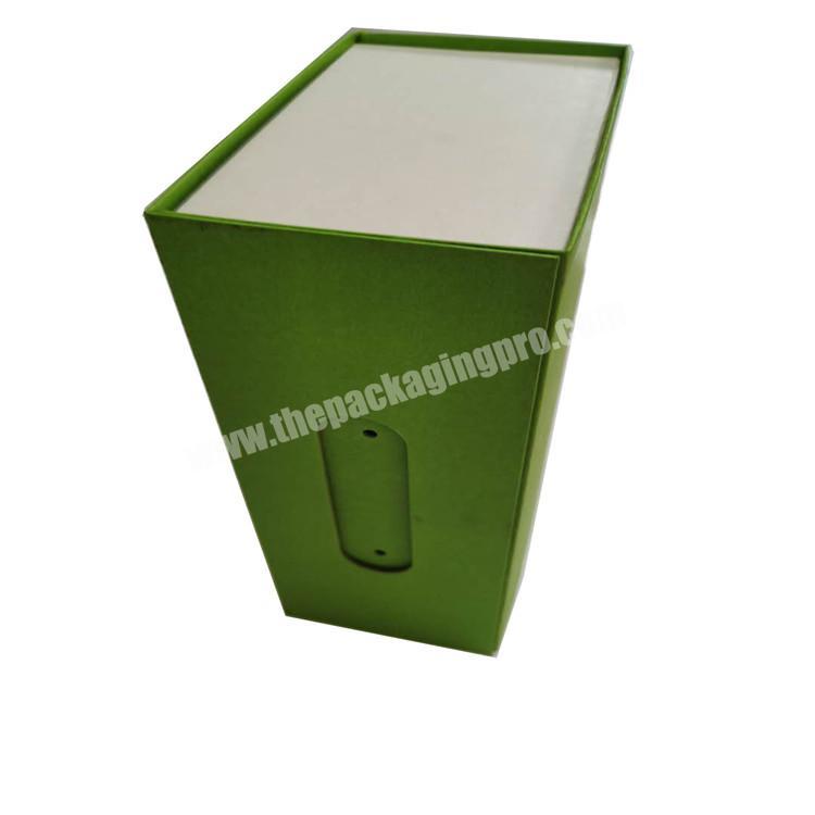 Available at Any Time Portable Green Shoes Clothes Packing Box with Rope on the Shelf