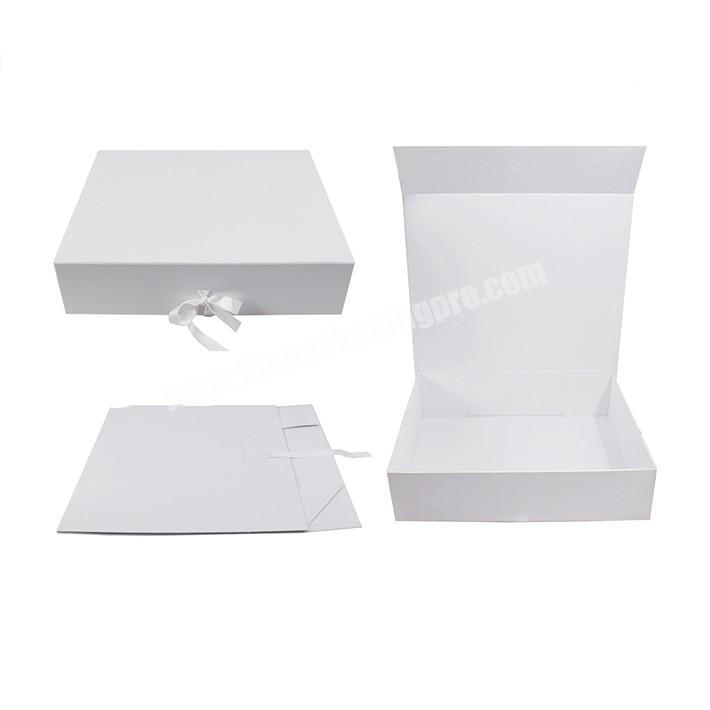 Beautiful design white cardboard packing box with black logo and ribbon