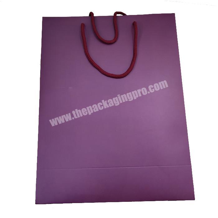 China Factory Cheap Custom Carrier Paper Bag With Reinforced Handle For Item Packaging