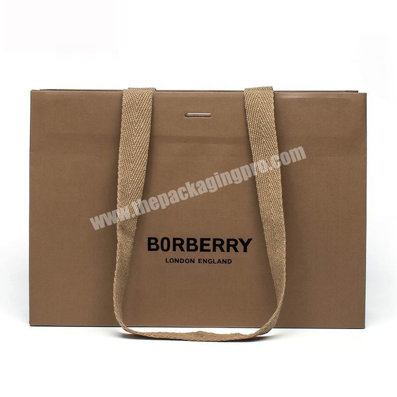 China factory custom kraft paper big t-shirt shopping bag with ribbon handle embedded