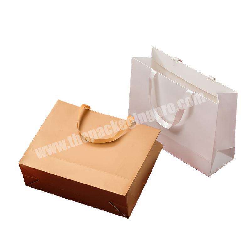 China Manufacturer Luxury White Paper Hand Bag, Wholesale Colorful Recycled kraft Custom Printed Paper Bag