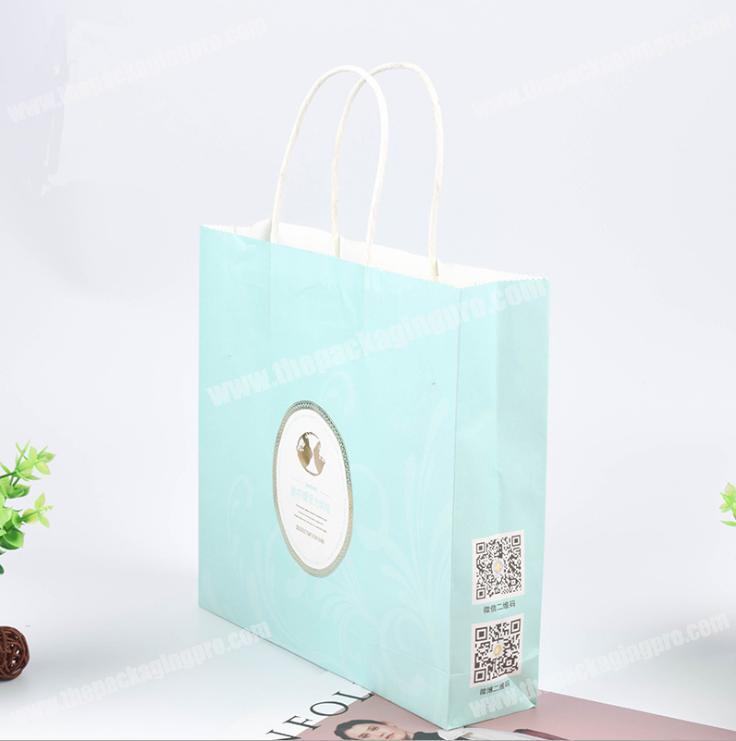 Chinese supply raw materials strong paper bags with handles