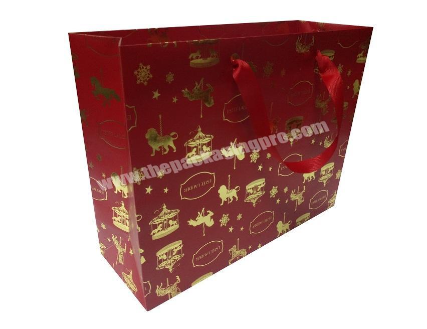 Custom Colorful Glossy Gold Stamping Red Christmas Gift Paper Kraft Bags with Ribbon Knot