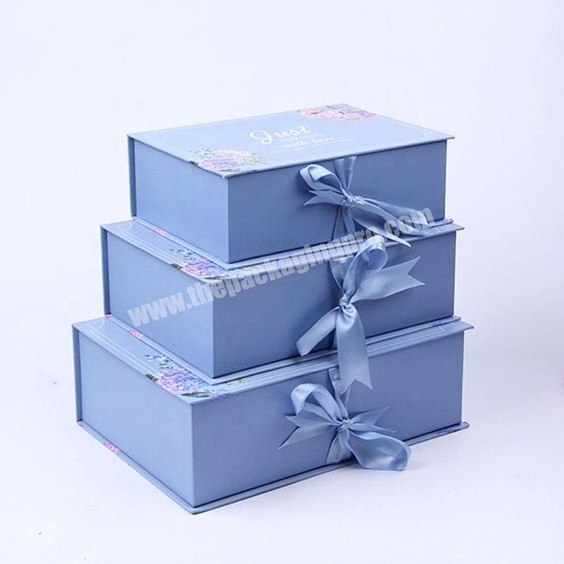 Custom Elegant Luxury Cardboard Clamshell Magnetic Navy Blue Christmas Eve Gift Box Beauty Products Packaging Boxes With Ribbon