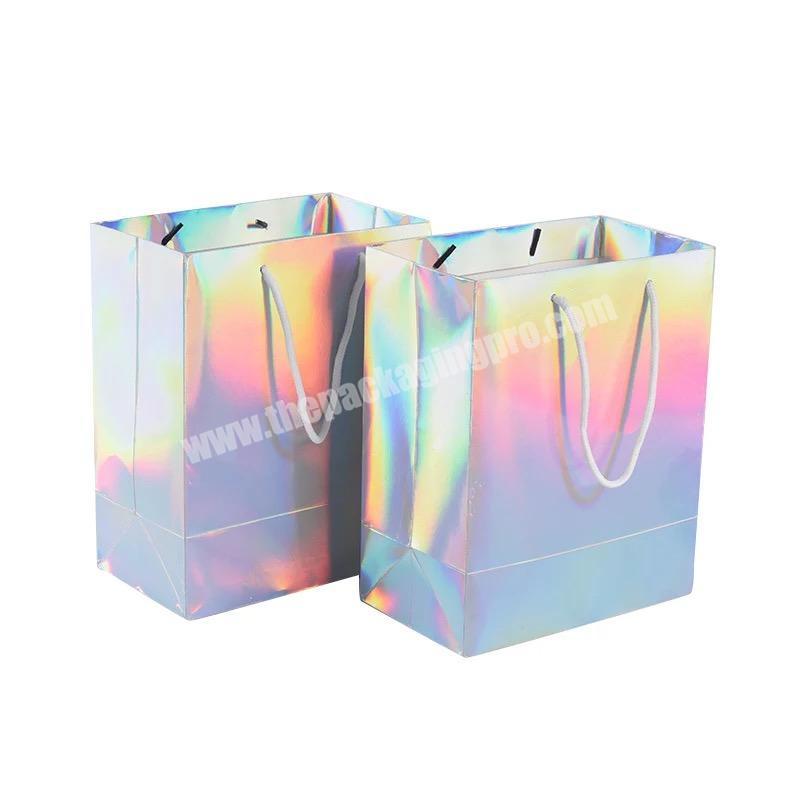 Custom Fashion Luxury Brand Holographic Glitter Hologram Paper Bag Shopping Apparel Packaging Bag With Ribbon Handle