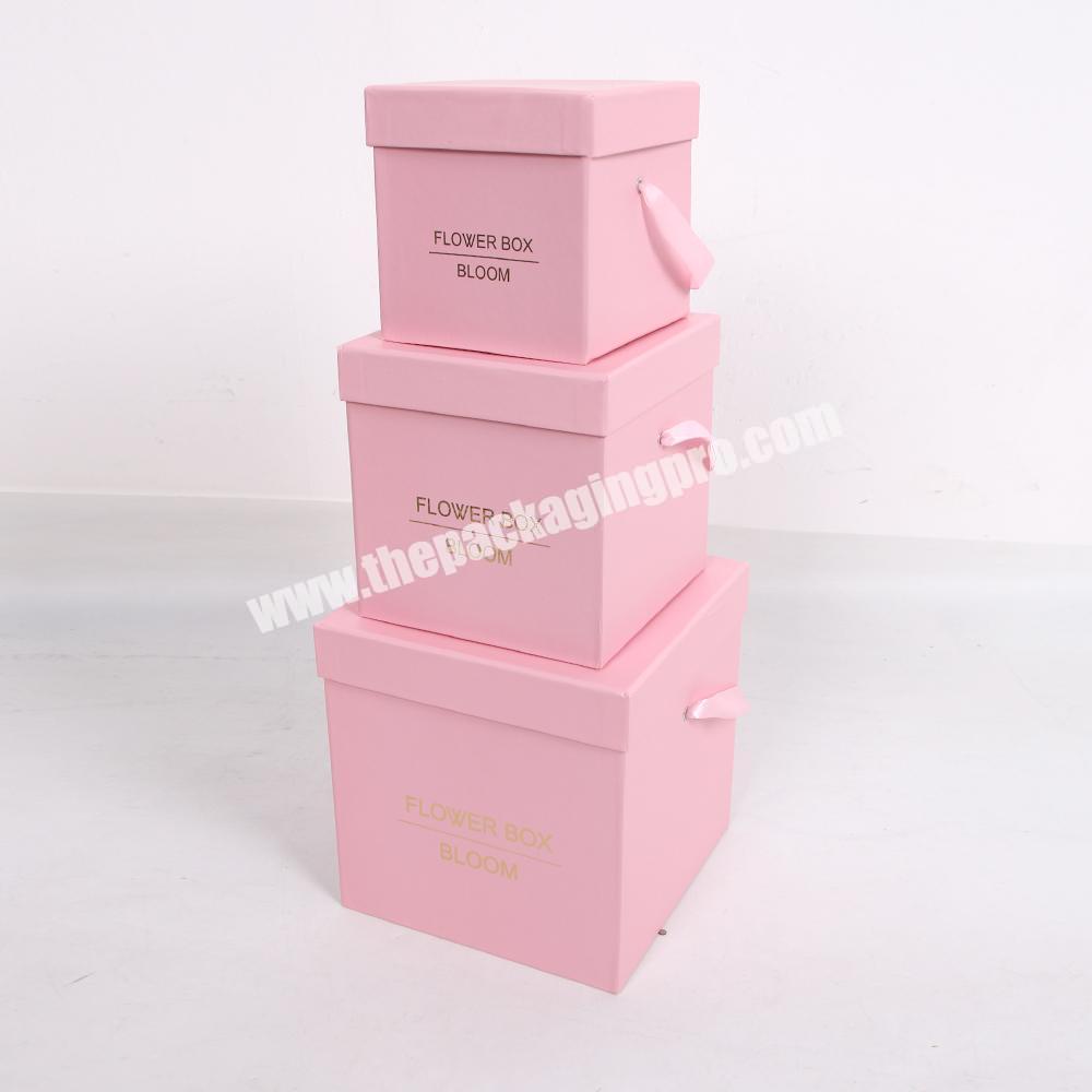 Custom Gold Hot Stamping Square Pink Paper Gift Boxes With Ribbon Handle