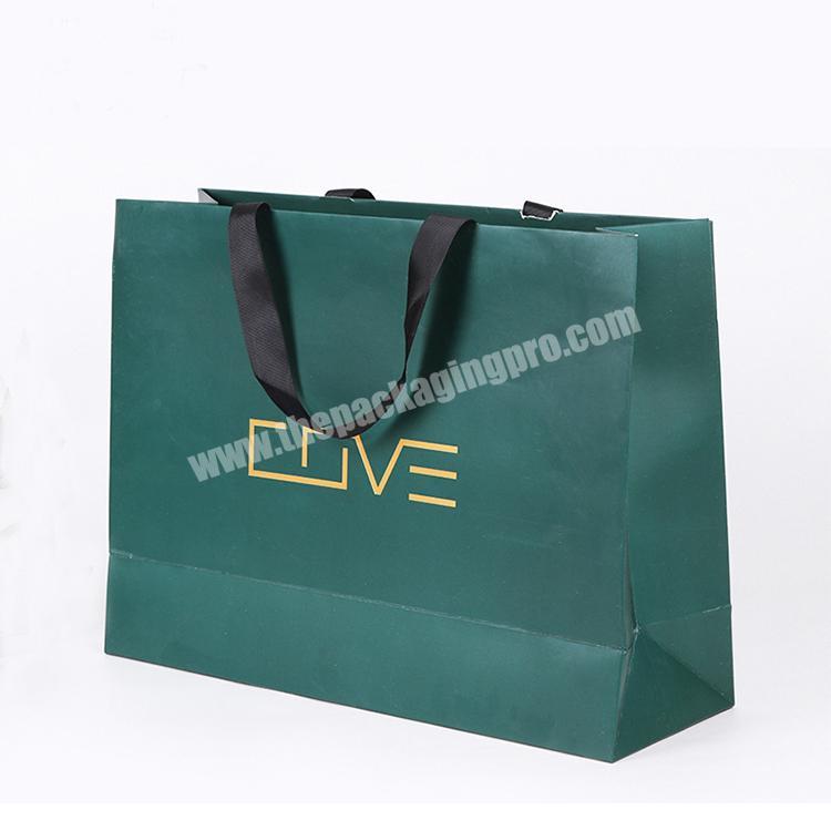 custom green glossy paper bag with gold hot stamping foil
