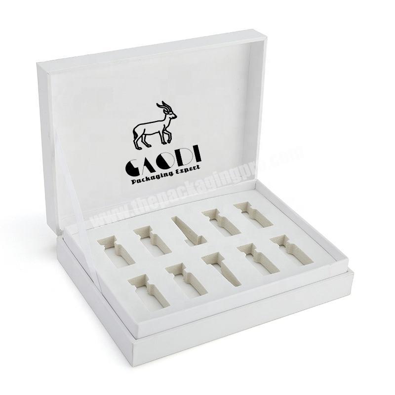 Custom High Quality Essential Oil Set Packaging Box Book Shape Magnetic Closure Cardboard Boxes With EVA Foam Insert