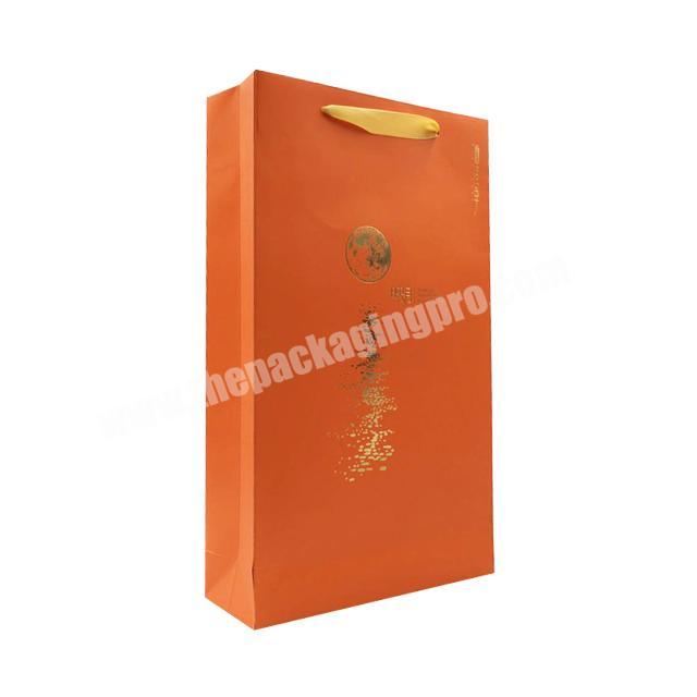 Custom logo luxury orange cardboard paper bag with ribbon handle