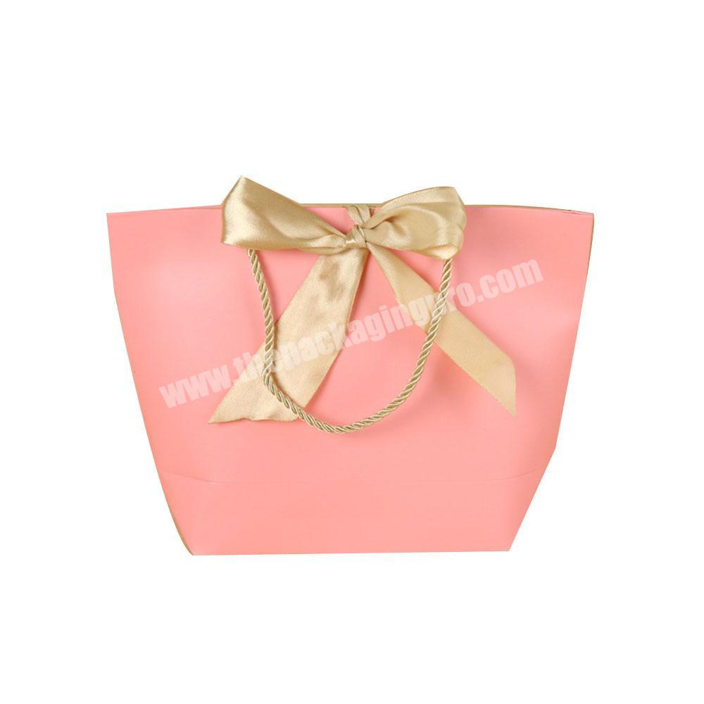 Custom Logo Luxury Pink Cloth Cardboard Paper Bag With Ribbon Handle