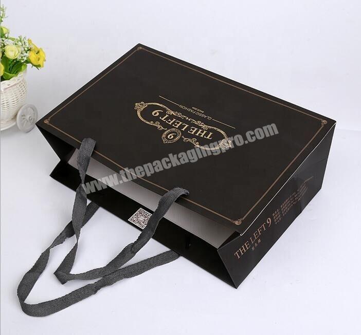 Custom luxury black shopping bag gold foiled logo printing gift cloth shoes packaging carry paper bag