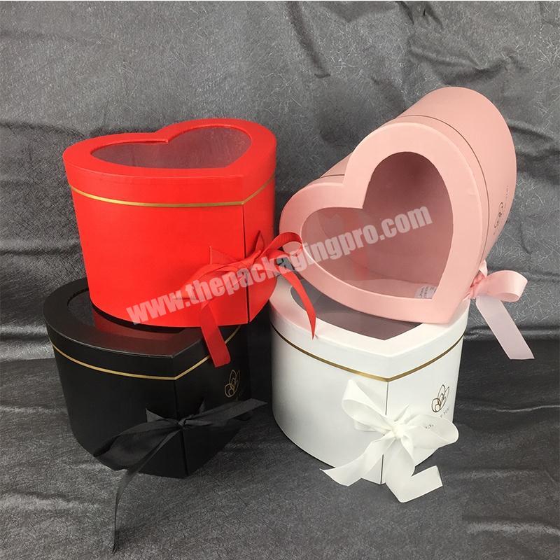 Manufacturer Custom Luxury Heart Shape Pink Paper Cardboard Flower Packaging Box Rotating Flower Box With Ribbon Tie