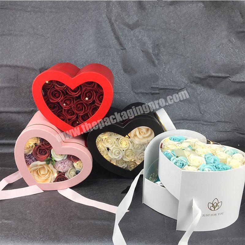 Wholesale Custom Luxury Heart Shape Pink Paper Cardboard Flower Packaging Box Rotating Flower Box With Ribbon Tie