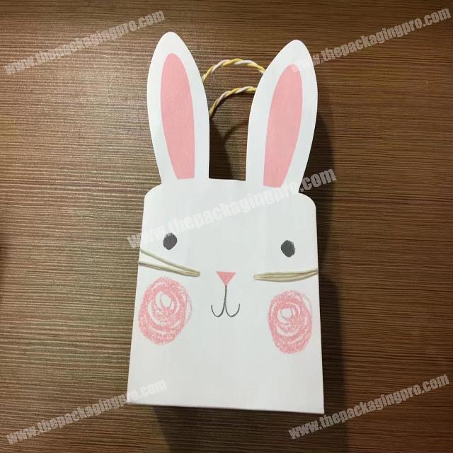 Custom-made white kraft paper cartoon hand bag gift bag can be printed logo