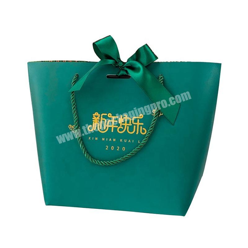 Custom Printed Retail Clothing Store Packaging Art Paper Shopping Bags Gift Packaging Paper Bags For Clothes