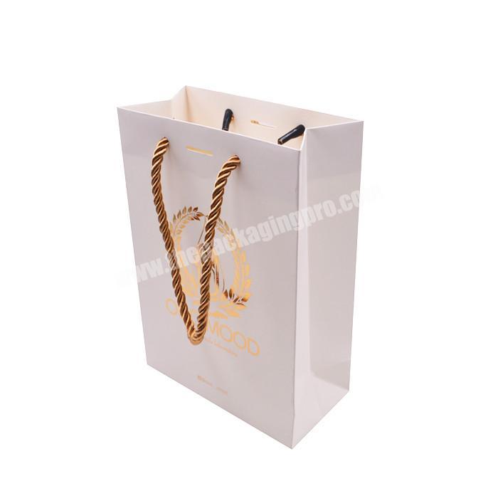 Custom printing gold foil logo shopping bag for makeup white packaging cosmetic gift white paper bag with ribbon