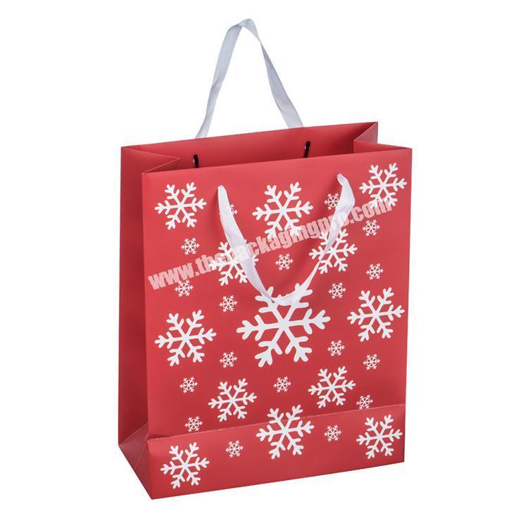 Custom recyclable CMYK Christmas gift snowflake paper bag for Xmas decorations