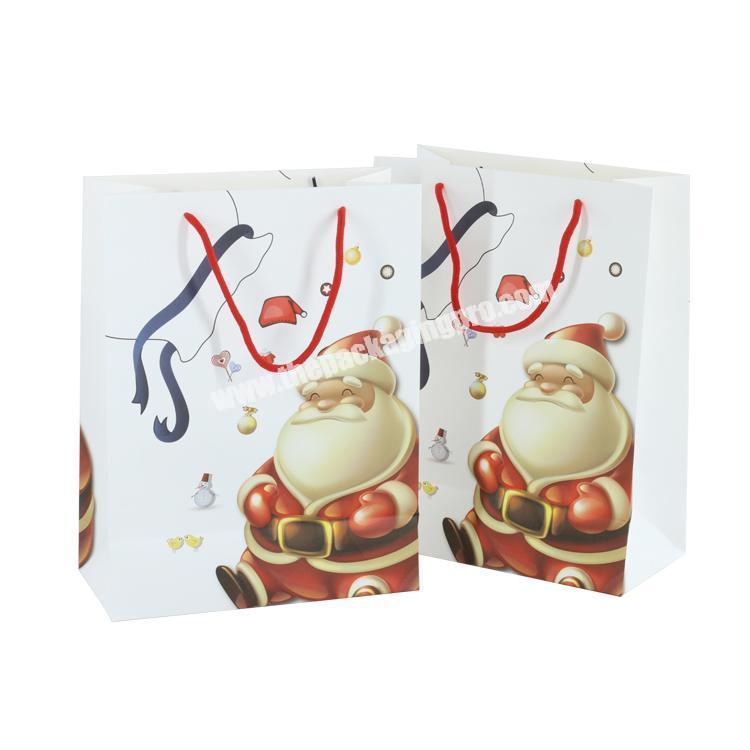 Custom recyclable CMYK packaging gift bags , Santa Claus printing white kraft paper bag xmas decorations