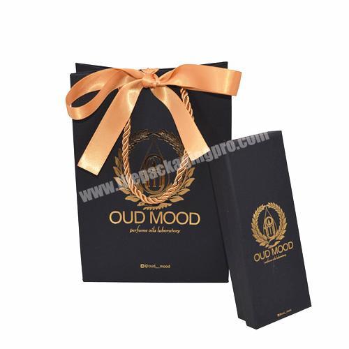 Custom your own logo luxury matt lamination gold hot stamp paper bag gift box set with rope for packaging fountain pen notebook