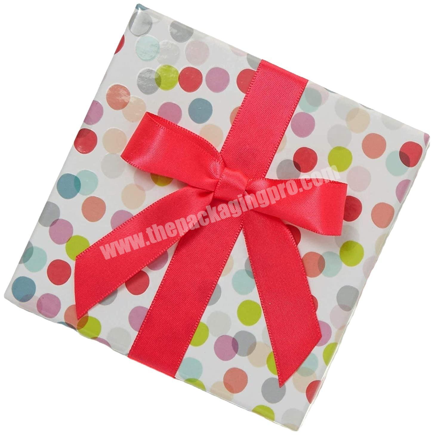 Customized birthday party gift box with colorful dots and bow