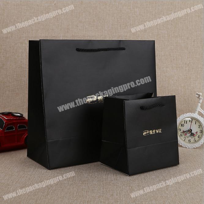 Customized Fashion gold stamping black paper bag with rope tote