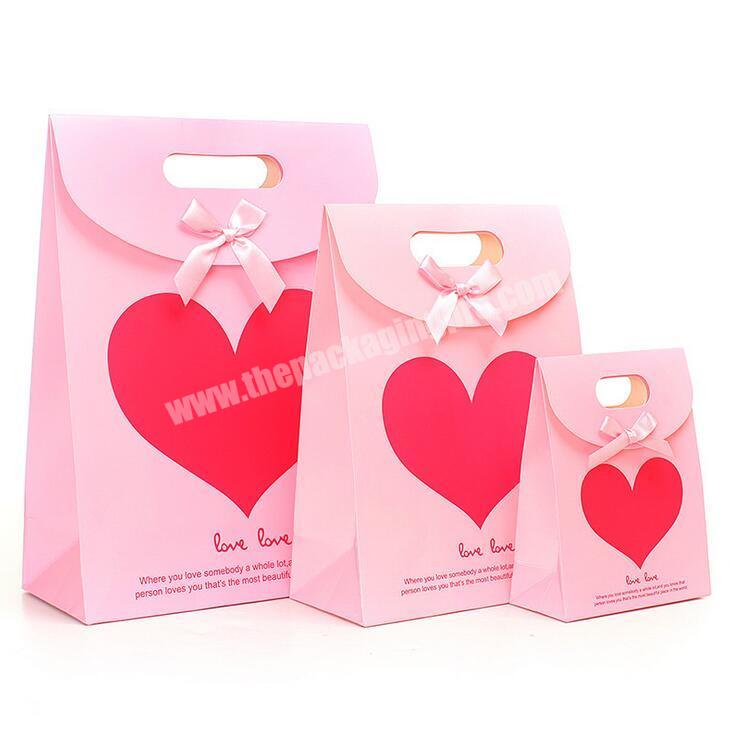 Customized logo heart shape wedding printing gift packaging paper bag wholesale