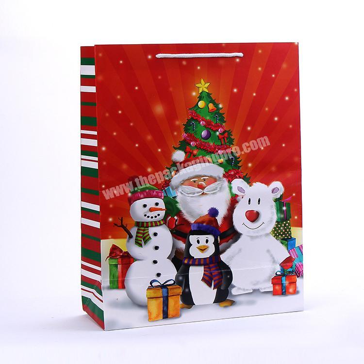 Customized logo recyclable packing CMYK paper santa gift bag for Christmas packaging