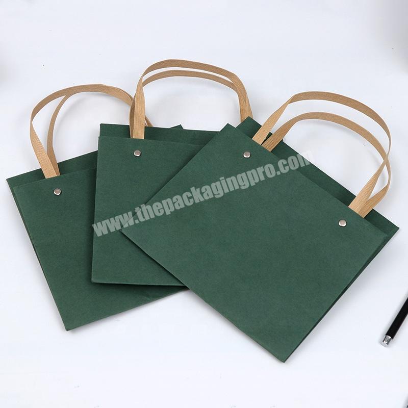 Customized logo square bottom shopping gift carry kraft paper bag with flat handle