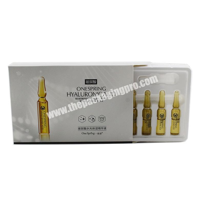 Customized luxury  essential oil paperboard sliding  perfume bottle packaging boxes with white inserts
