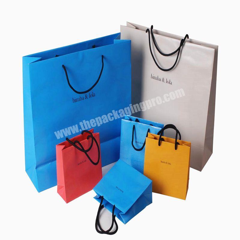 Customized  paper bags carriers shopping bags printing paper bag handle