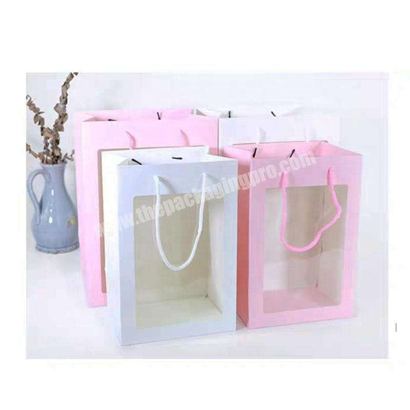 Customized Printed Valentine'S Day Ivory Board Paper Gift Bags Rose Flower Packaging Bag With Clear Window