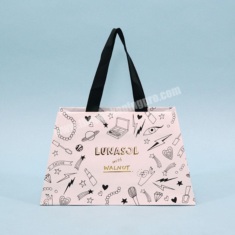 Cute small paper packaging bags custom logo shopping gift bags for cosmetics