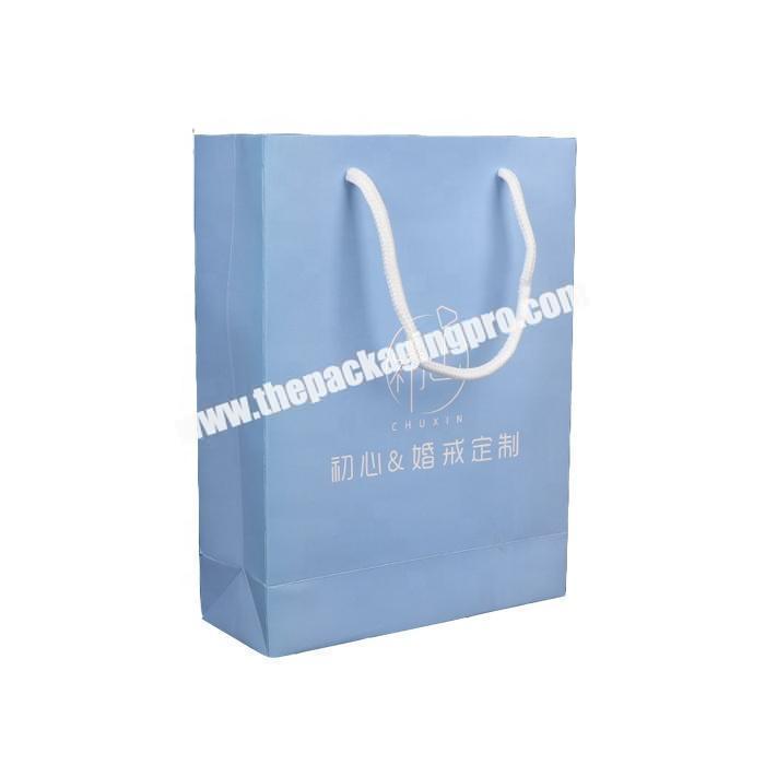 Cute white paper gift packaging bag with custom logo printing