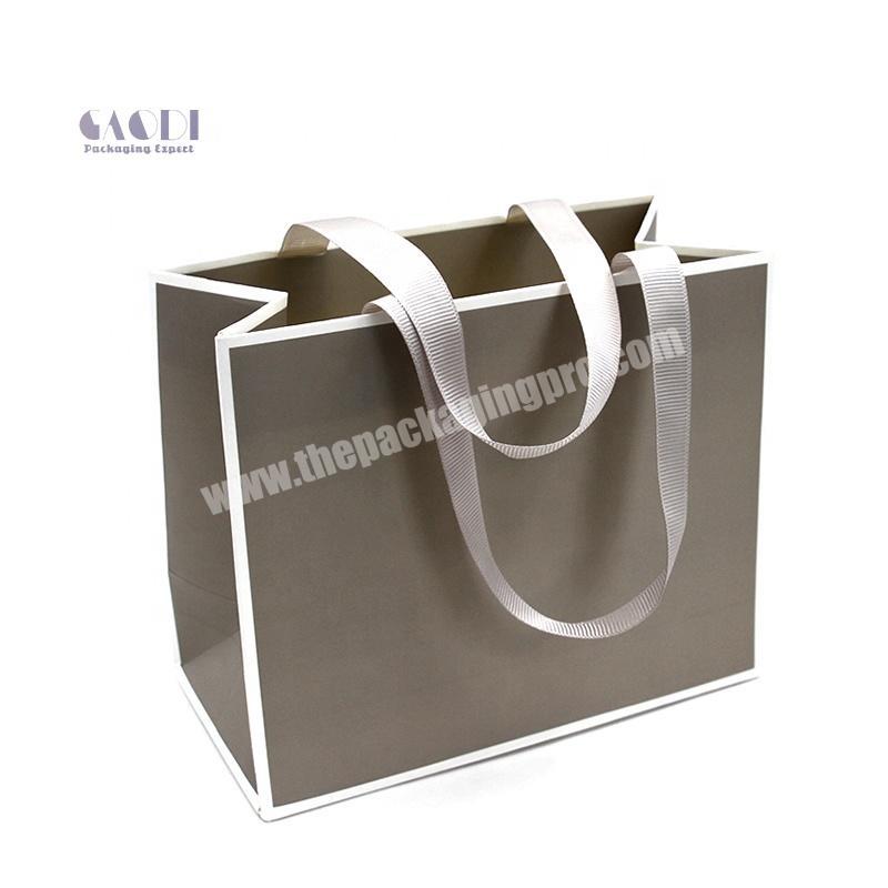 Dongguan Elegant Customized Brand Logo Luxury Boutique Shopping Brown Paper Gift Bags With Ribbon Handles