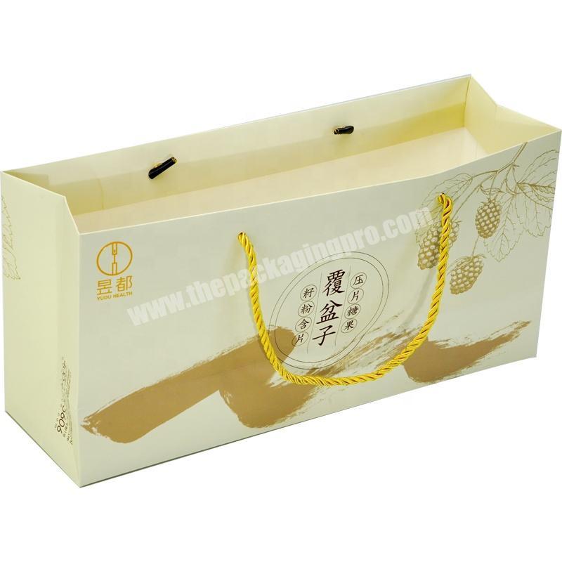 Dongming fashion high quality food packaging white cardboard paperbag with twisted rope