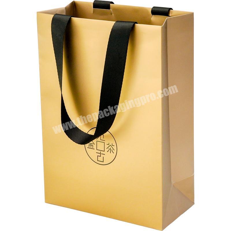Dongming luxury recycled custom printing logo tea packing white cardboard gold paperbag with ribbon rope