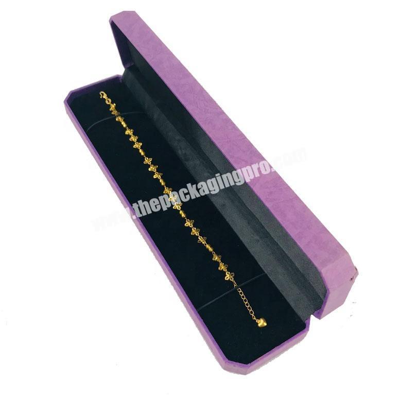 durable strong long and narrow  octagonal shape gold bracelet box with fixed elastic inlay