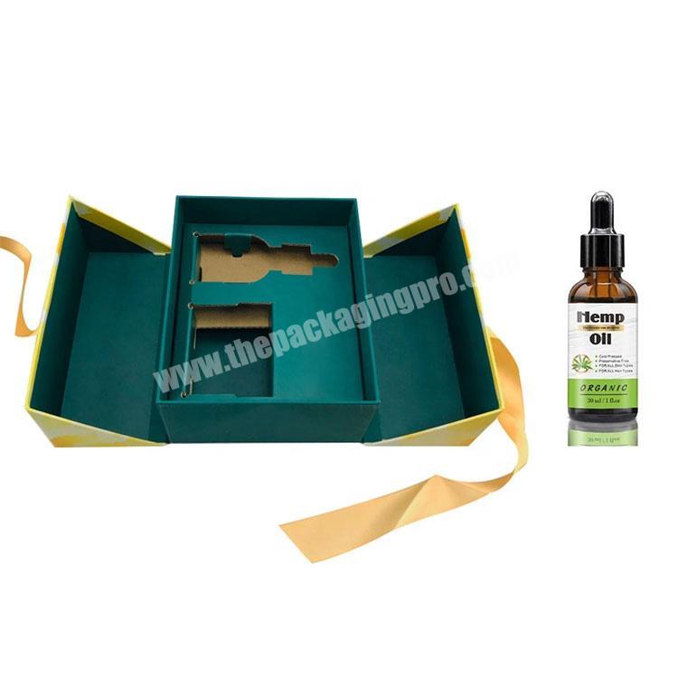 Eco-friendly rectangle door open essential oil packaging boxbody care boxcosmetic box with ribbon