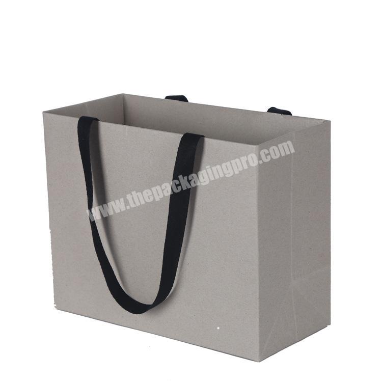 Factory cheap paper gift bag raw materials of paper bag with handle