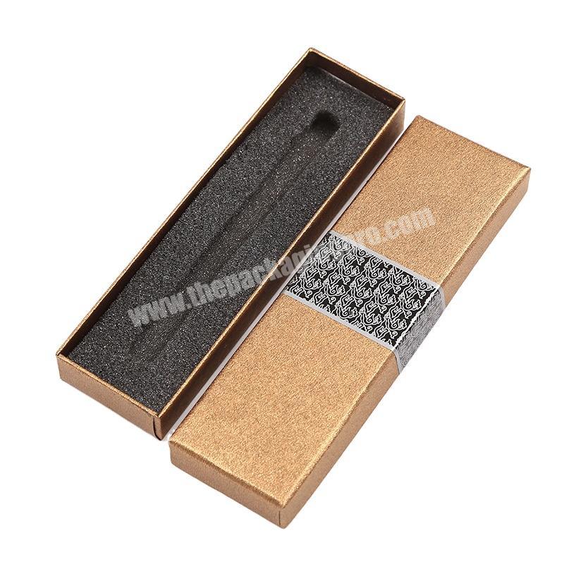 Factory customized luxury lifting box gift packaging with gold foil printed badge lined with pen packaging