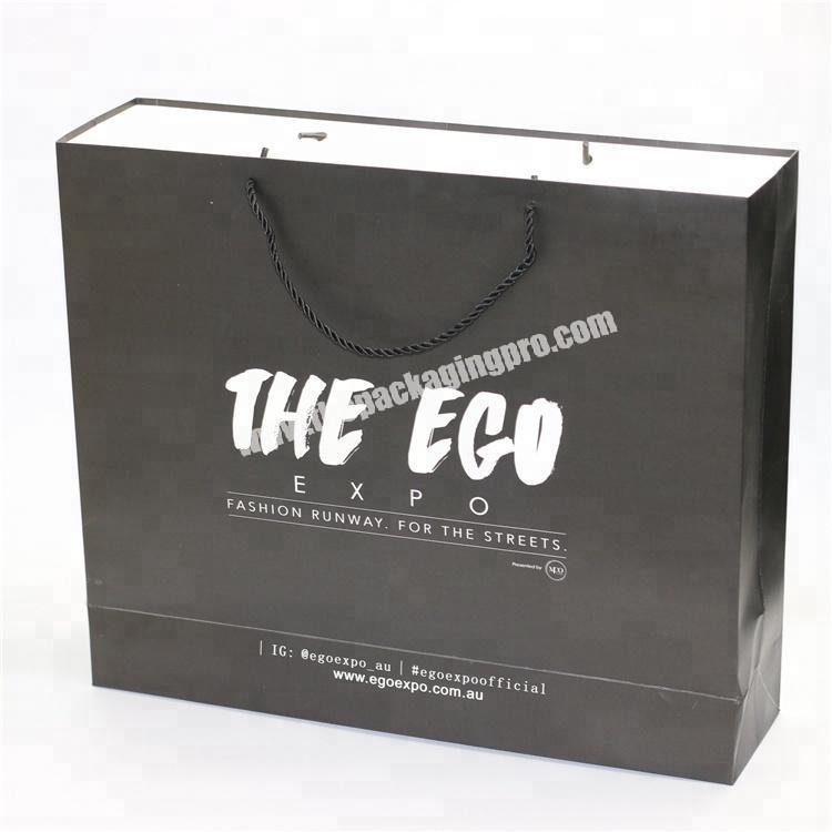 Factory price black matt paper bag with white logo for garment packaging