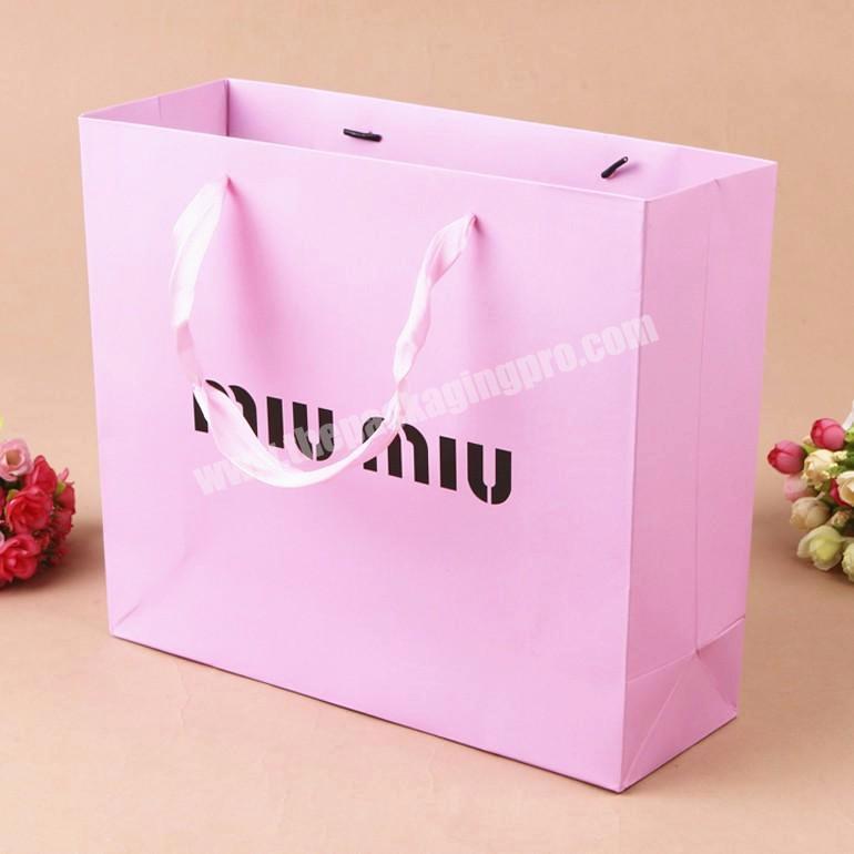 Factory Sale Custom Luxury Pink Packaging Paper Bag Big Tote Shopping Bags Carries Packaging For Clothes  Gift Pack