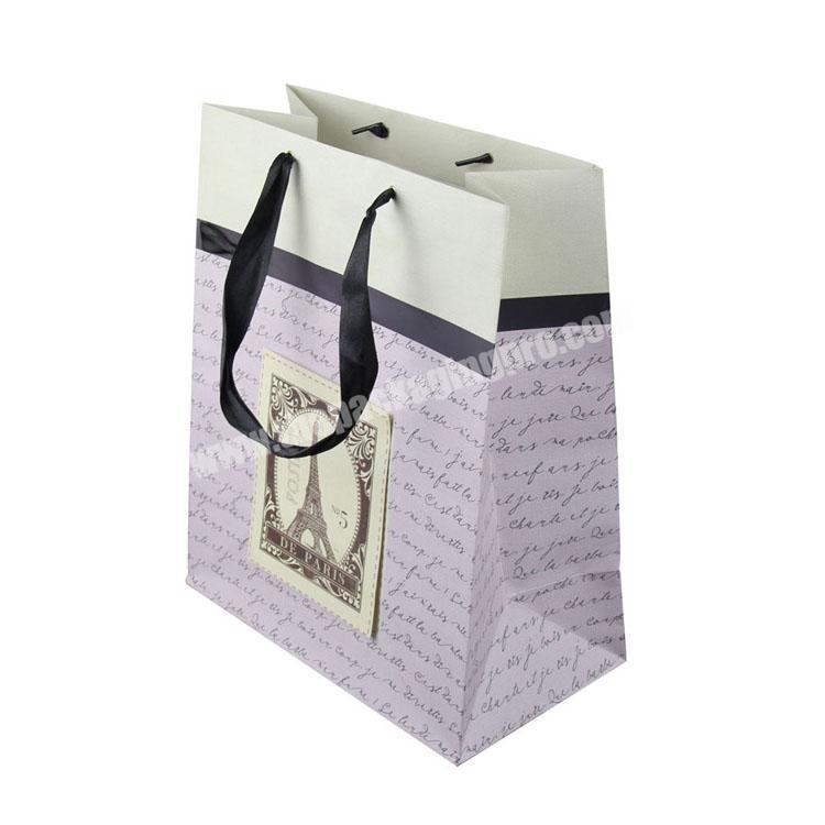 Factory wholesale price printed shopping bags manufacturers with ribbon rope
