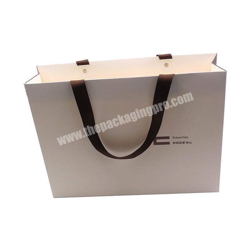 Fashion Recycled Customized Printed Art Gift Paper Bags For Clothing With Flat Handle