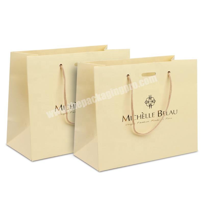 Fashion yellow custom print gold logo cloth paper gift shopping bag for clothing