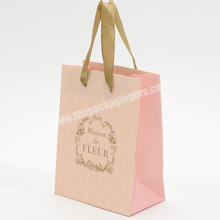 Free design paper gift bag shopping bags pink gift bags with ribbon for cosmetic