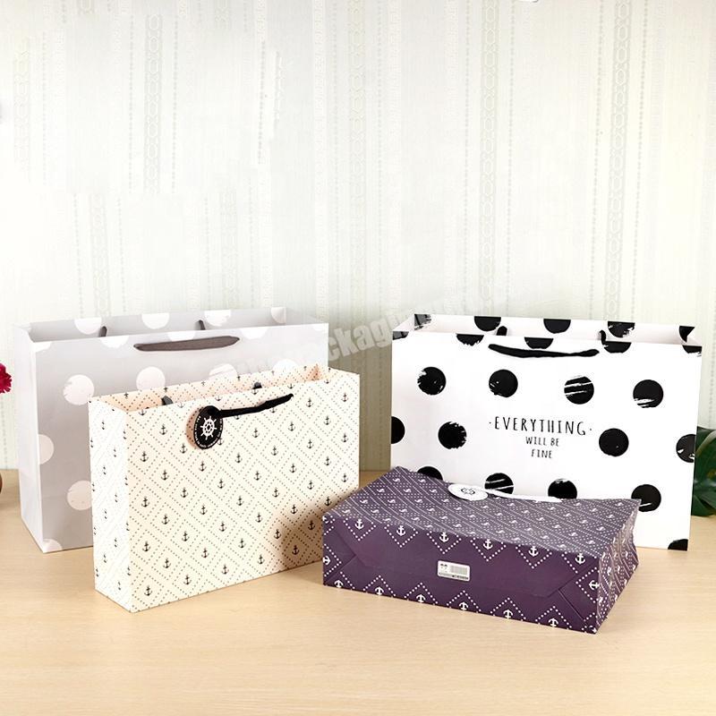 Gaodi Customized Classic Design Polka Dot Beauty Products Paper Packaging Bags Gift Bag For Skincare