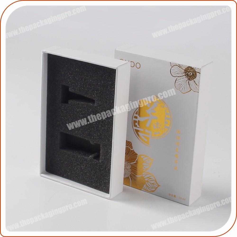 gold foil custom hard cardboard cosmetic paper packing box with foam insert